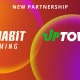 uptowin-+-dynabit-gaming:-powering-social-play-with-hold-and-win-mechanics